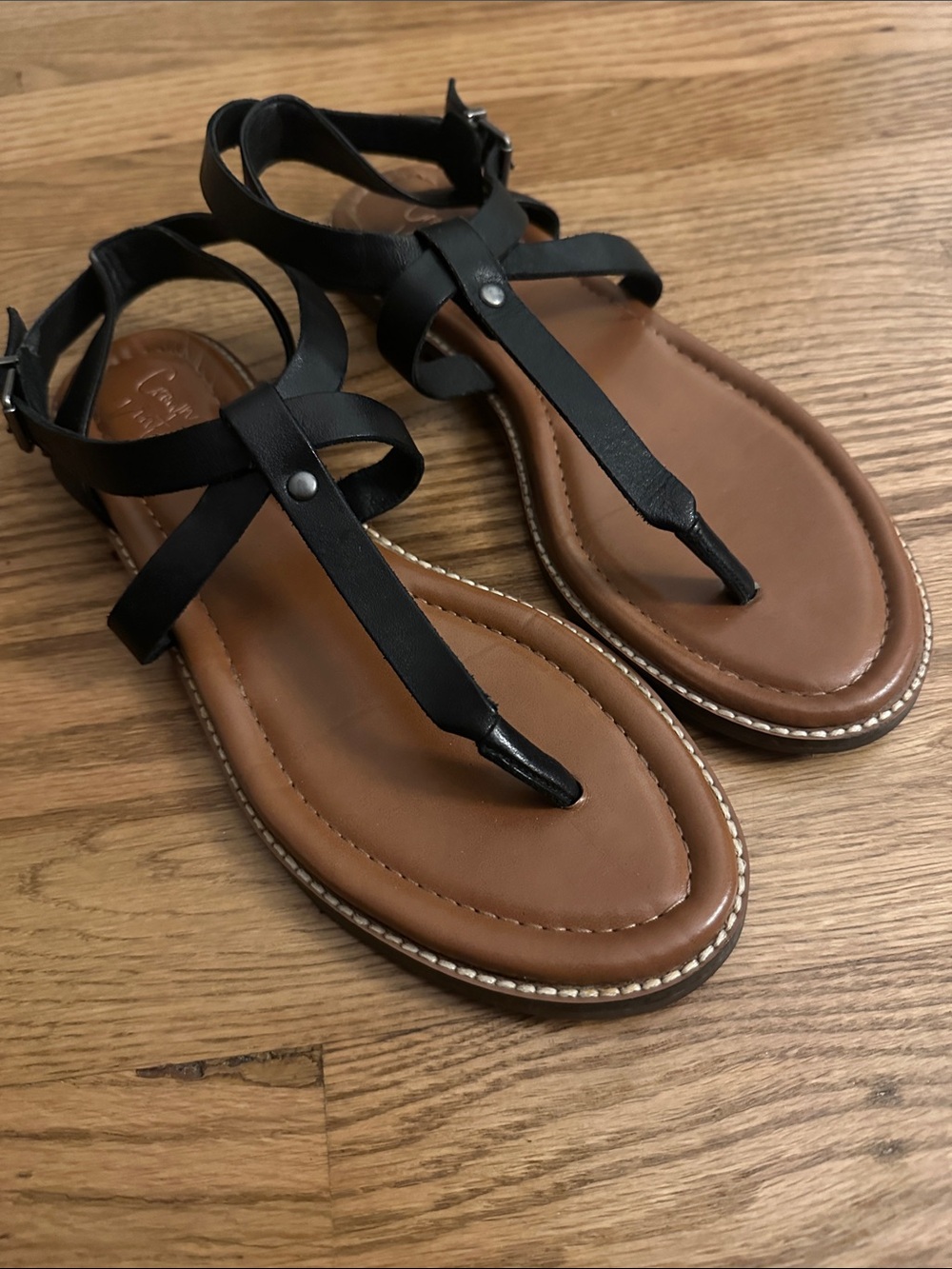Crown Vintage Black T‑Strap Sandals with Brown Footbed